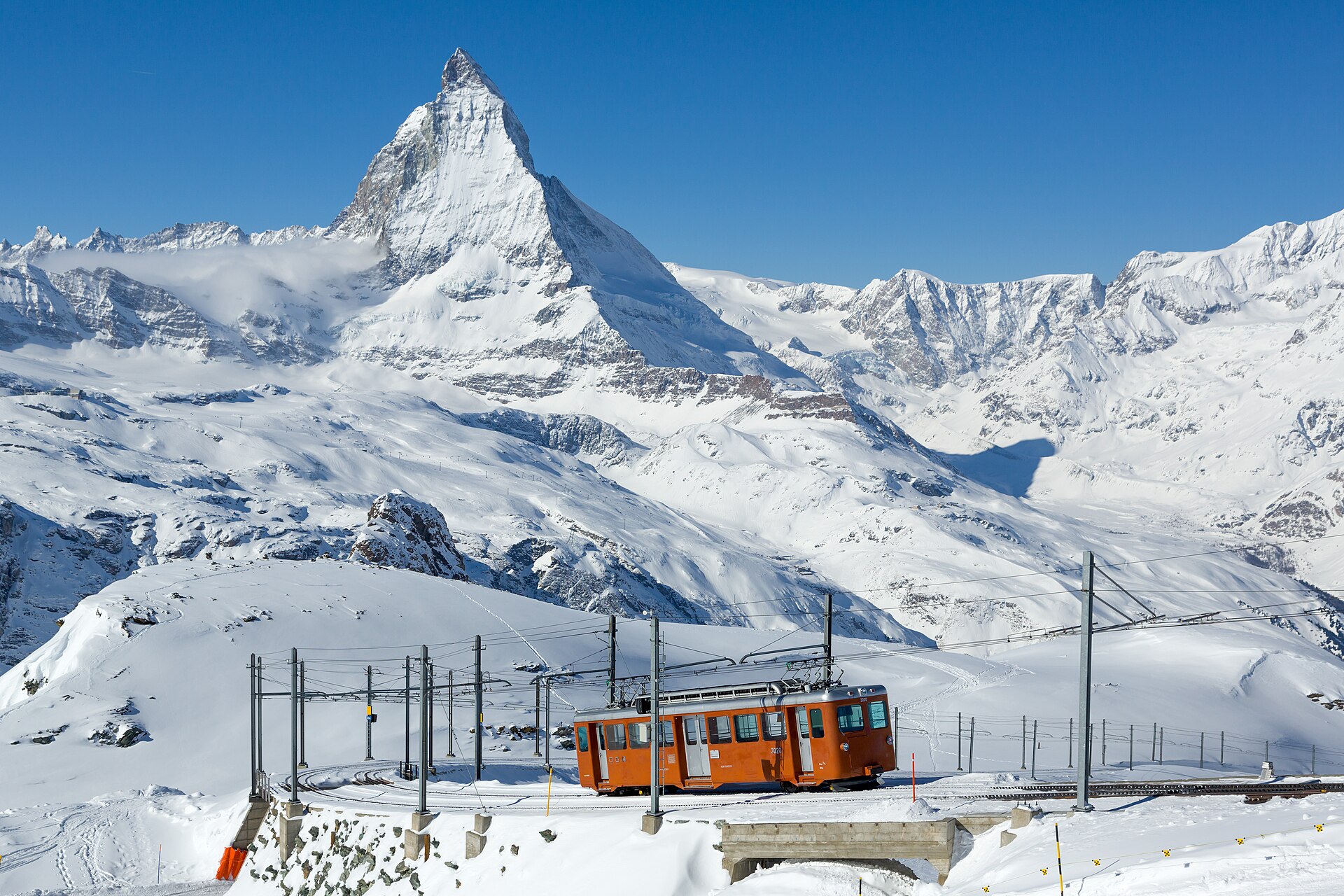 The Gornergrat railway climbing above Zermatt in winter